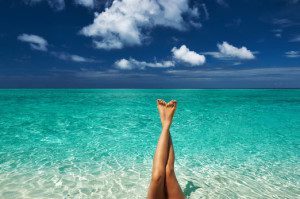 http://www.dreamstime.com/royalty-free-stock-image-woman-s-beautiful-legs-beach-image30220386